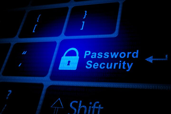 A pictorial with a keyboard background and the words "password security" with a key lock suggesting the security of using a password manager